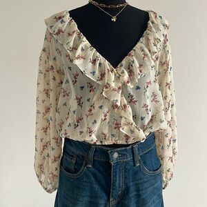 Urban Outfitters Floral long sleeves and ruffles blouse